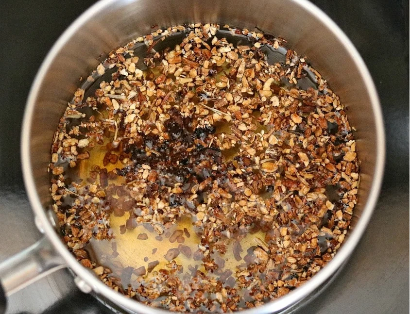 the pot of boiling dandelion root coffee alternative